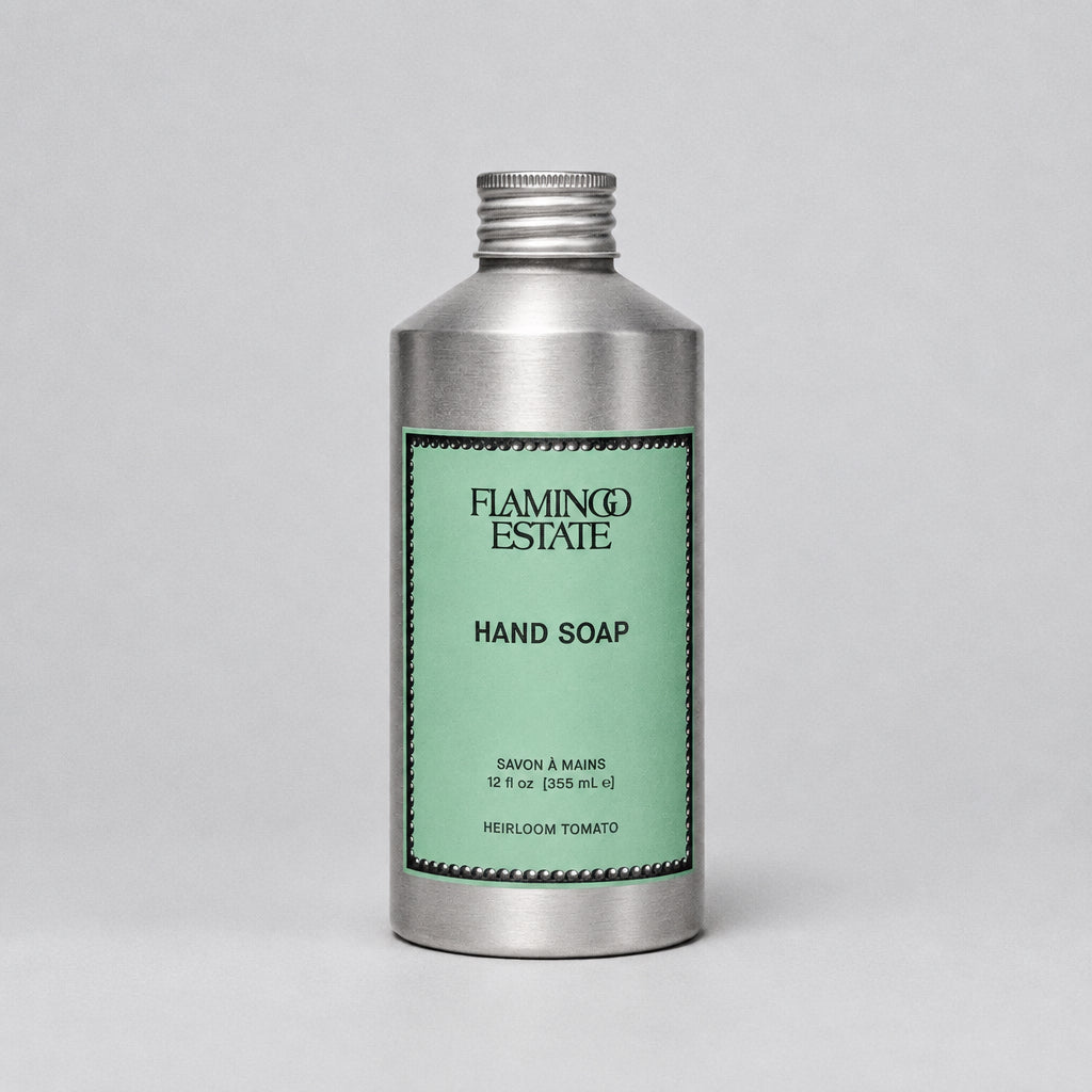 Hand soap bottle with green label on a white background