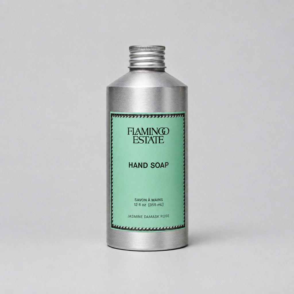 Silver bottle of Flamingo Estate hand soap on a white background