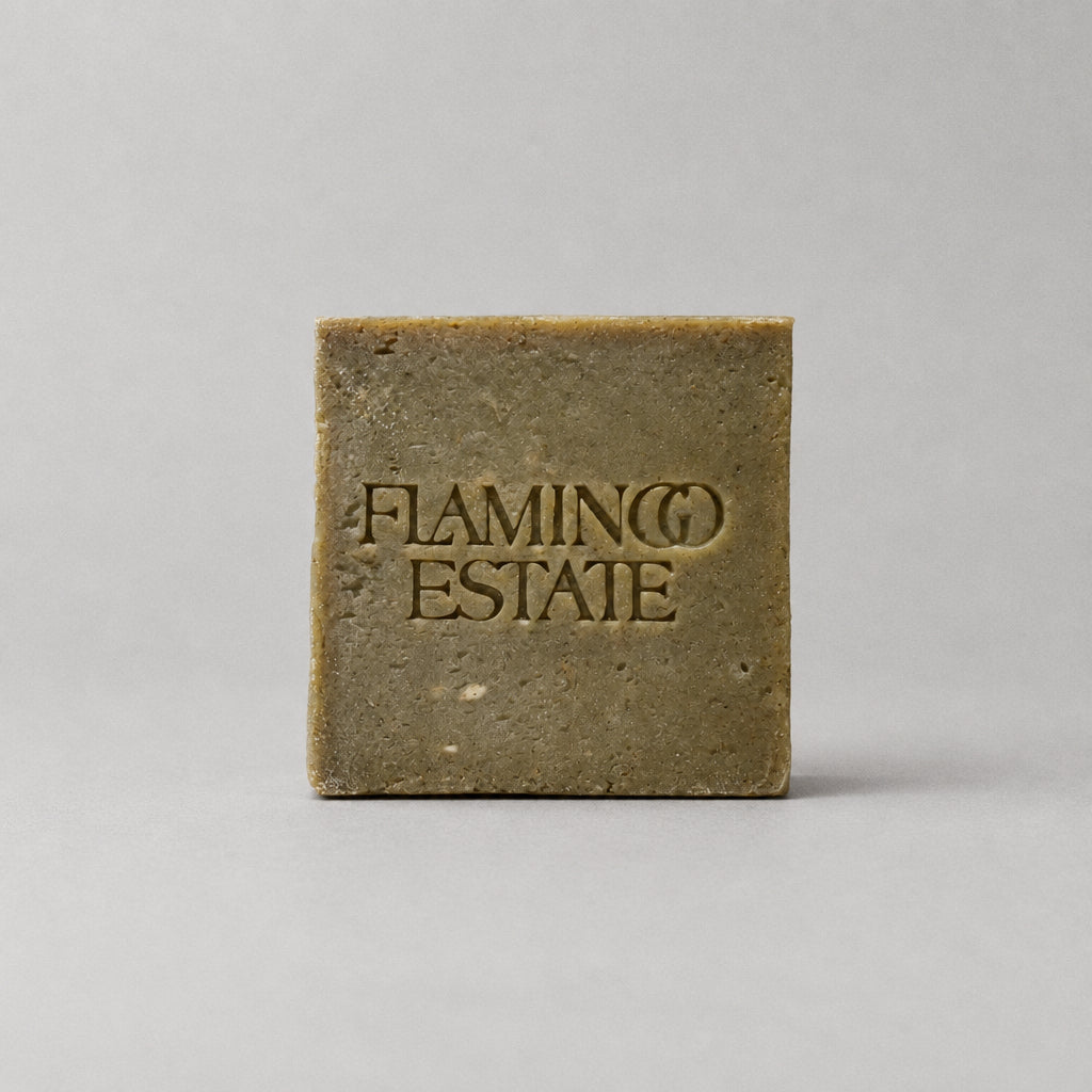 Bar of soap with 'Flaming Estate' branding on a white background